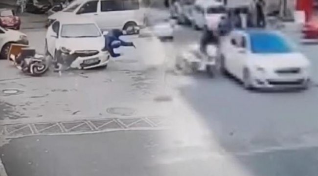 Otomobille çarpışan motosiklet takla attı, sürücüsü yola savruldu