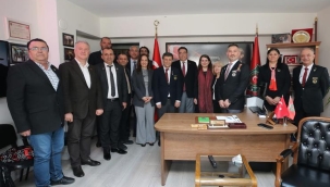 Karşıyaka'da gaziler ve şehit ailelerine anlamlı ziyaret